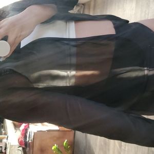 Sheer cover up top with a hook button at the front